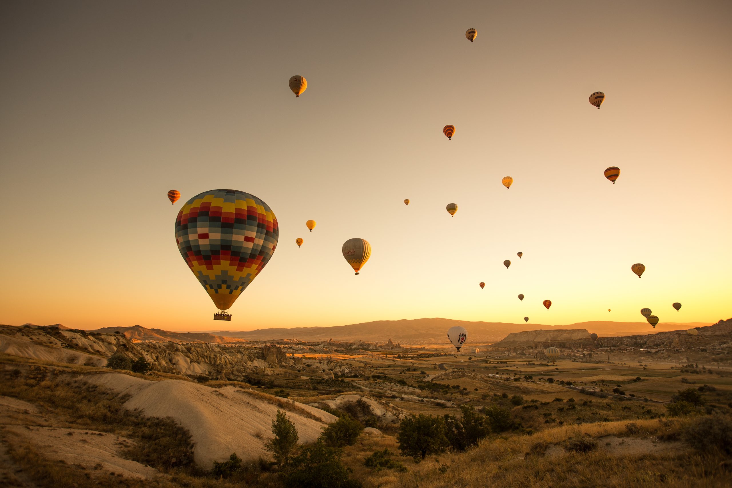 set colored balloons flying ground cappadocia turkey scaled